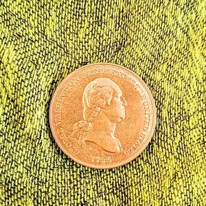 Peace and friendship remake coin